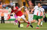 25 July 2025; Conor Reynolds of Sligo Rovers in action against Josh Fitzpatrick of Cork City during the SSE Airtricity Men's Premier Division match between Cork City and Sligo Rovers at Turner's Cross in Cork. Photo by Ben McShane/Sportsfile