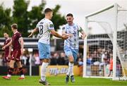 25 July 2025; Pádraig Amond of Waterford celebrates with team-mate Tommy Lonergan, left, after scoring their side's second goal during the SSE Airtricity Men's Premier Division match between Galway United and Waterford at Eamonn Deacy Park in Galway. Photo by Piaras Ó Mídheach/Sportsfile