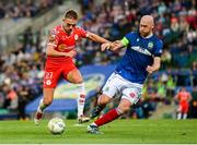 16 July 2025; Evan Caffrey of Shelbourne in action against Chris Shields of Linfield during the UEFA Champions League First Qualifying Round second leg match between Linfield and Shelbourne at Clearer Twist National Football Stadium at Windsor Park in Belfast. Photo by Stephen McCarthy/Sportsfile