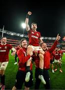 26 July 2025; Hugo Keenan of British & Irish Lions is held aloft by Mack Hansen, left, and Jamie George after the second test match between Australia and the British & Irish Lions at the Melbourne Cricket Ground in Melbourne, Australia. Photo by Brendan Moran/Sportsfile