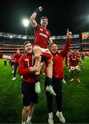 26 July 2025; Hugo Keenan of British & Irish Lions is held aloft by Mack Hansen, left, and Jamie George after the second test match between Australia and the British & Irish Lions at the Melbourne Cricket Ground in Melbourne, Australia. Photo by Brendan Moran/Sportsfile