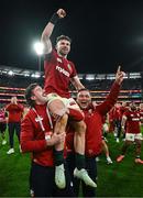 26 July 2025; Hugo Keenan of British & Irish Lions is held aloft by Mack Hansen and Jamie George after the second test match between Australia and the British & Irish Lions at the Melbourne Cricket Ground in Melbourne, Australia. Photo by Brendan Moran/Sportsfile
