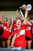 26 July 2025; Cork captain Allie Tobin lifts the cup after her side's victory in the ZuCar All-Ireland U18 A Ladies Football Championship final match between Cork and Dublin at Grant Heating St Brendan’s Park in Birr, Offaly. Photo by Seb Daly/Sportsfile