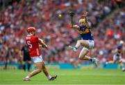 20 July 2025; Ciarán Joyce of Cork in action against Andrew Ormond of Tipperary during the GAA Hurling All-Ireland Senior Championship final match between Cork and Tipperary at Croke Park in Dublin. Photo by Stephen McCarthy/Sportsfile