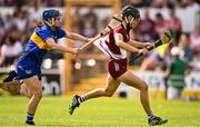 26 July 2025; Carrie Dolan of Galway is tackled by Julieanne Bourke of Tipperary during the Glen Dimplex All-Ireland Camogie Senior Championship semi-final match between Galway and Tipperary at UPMC Nowlan Park, Kilkenny. Photo by Ben McShane/Sportsfile