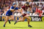26 July 2025; Carrie Dolan of Galway in action against Julieanne Bourke of Tipperary during the Glen Dimplex All-Ireland Camogie Senior Championship semi-final match between Galway and Tipperary at UPMC Nowlan Park, Kilkenny. Photo by Ben McShane/Sportsfile