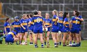 26 July 2025; Tipperary players, including Amy Quinlisk, right, and Mairead Eviston of Tipperary react after their side's defeat in the Glen Dimplex All-Ireland Camogie Senior Championship semi-final match between Galway and Tipperary at UPMC Nowlan Park, Kilkenny. Photo by Ben McShane/Sportsfile