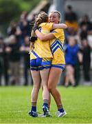 26 July 2025; Clare players Hazel Keating, right, and Molly Potter celebrate after their side's victory in the ZuCar All-Ireland U18 B Ladies Football Championship final match between Clare and Sligo at Connacht GAA Centre of Excellence in Bekan, Mayo. Photo by Piaras Ó Mídheach/Sportsfile