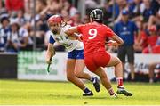 26 July 2025; Eimear O'Neill of Waterford gets past the tackle of Ashling Thompson of Cork during the Glen Dimplex All-Ireland Camogie Senior Championship semi-final match between Cork and Waterford at UPMC Nowlan Park, Kilkenny. Photo by Ben McShane/Sportsfile