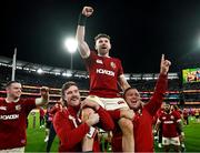 26 July 2025; Winning try scorer Hugo Keenan of British & Irish Lions is lifted by teammates Mack Hansen, left, and Jamie George as they celebrate after the second test match between Australia and the British & Irish Lions at the Melbourne Cricket Ground in Melbourne, Australia. Photo by Brendan Moran/Sportsfile