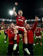 26 July 2025; Winning try scorer Hugo Keenan of British & Irish Lions is lifted by teammates Mack Hansen, left, and Jamie George as they celebrate after the second test match between Australia and the British & Irish Lions at the Melbourne Cricket Ground in Melbourne, Australia. Photo by Brendan Moran/Sportsfile