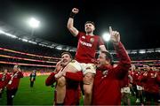 26 July 2025; Winning try scorer Hugo Keenan of British & Irish Lions is lifted by teammates Mack Hansen, left, and Jamie George as they celebrate after the second test match between Australia and the British & Irish Lions at the Melbourne Cricket Ground in Melbourne, Australia. Photo by Brendan Moran/Sportsfile