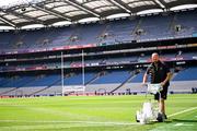 27 July 2025; Lead Groundsman Darren Jepson paints the pitch before the GAA Football All-Ireland Senior Championship final match between Kerry and Donegal at Croke Park in Dublin. Photo by Ramsey Cardy/Sportsfile