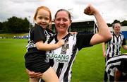27 July 2025; Rachel McLoughlin of Whitehall Rangers celebrates with her daughter Robyn after the FAI Women’s Amateur Cup final match between Terenure Rangers and Whitehall Rangers at UCD Bowl in Dublin. Photo by Ben McShane/Sportsfile