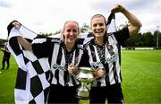 27 July 2025; Leah McHugh, left, and Jane McKevitt of Whitehall Rangers celebrate with the cup after the FAI Women’s Amateur Cup final match between Terenure Rangers and Whitehall Rangers at UCD Bowl in Dublin. Photo by Ben McShane/Sportsfile