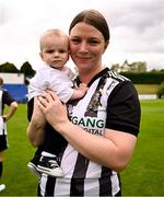 27 July 2025; Helen Cooney of Whitehall Rangers celebrates with her son Riley, age 6 months, after the FAI Women’s Amateur Cup final match between Terenure Rangers and Whitehall Rangers at UCD Bowl in Dublin. Photo by Ben McShane/Sportsfile
