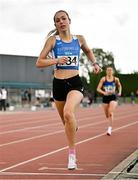27 July 2025; Lucy Clinton of Waterford AC, crosses the line to win the division one women's 800m during the 123.ie National League Final at Tullamore Harriers Athletics Club in Tullamore, Offaly. Photo by Sam Barnes/Sportsfile
