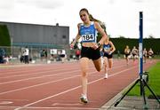 27 July 2025; Lucy Clinton of Waterford AC, crosses the line to win the division one women's 800m during the 123.ie National League Final at Tullamore Harriers Athletics Club in Tullamore, Offaly. Photo by Sam Barnes/Sportsfile
