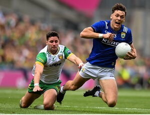 27 July 2025; David Clifford of Kerry in action against Brendan McCole of Donegal during the GAA Football All-Ireland Senior Championship final match between Kerry and Donegal at Croke Park in Dublin. Photo by David Fitzgerald/Sportsfile