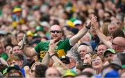 27 July 2025; A Kerry supporter celebrates a score during the GAA Football All-Ireland Senior Championship final match between Kerry and Donegal at Croke Park in Dublin. Photo by Stephen McCarthy/Sportsfile