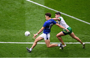 27 July 2025; David Clifford of Kerry kicks a score despite the efforts of Brendan McCole of Donegal during the GAA Football All-Ireland Senior Championship final match between Kerry and Donegal at Croke Park in Dublin. Photo by Dáire Brennan/Sportsfile