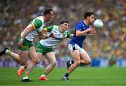 27 July 2025; Brian Ó Beaglaoich of Kerry in action against Finnbarr Roarty and Jason McGee of Donegal during the GAA Football All-Ireland Senior Championship final match between Kerry and Donegal at Croke Park in Dublin. Photo by Ray McManus/Sportsfile