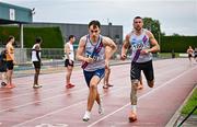 27 July 2025; The Dundrum South Dublin team on their way to winning the premier men's 4x400m relay during the 123.ie National League Final at Tullamore Harriers Athletics Club in Tullamore, Offaly. Photo by Sam Barnes/Sportsfile