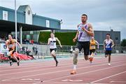 27 July 2025; Lorcan Murphy of Dundrum South Dublin AC, right, on his way to winning the premier men's 100m during the 123.ie National League Final at Tullamore Harriers Athletics Club in Tullamore, Offaly. Photo by Sam Barnes/Sportsfile