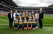 27 July 2025; Cumann na mBunscol Gary Farrell, LGFA president Trina Murray, INTO President Anne Horan, Uachtarán Chumann Lúthchleas Gael Jarlath Burns, with the Kerry team, back row, left to right, Eabha Moynihan, Holy Family, Rathmore, Kerry, Emily Kavanagh, St Colman's NS, Mucklagh, Offaly, Eimear Farrell, St Oliver Plunkett PS, Blackcastle, Meath, Ellie Dooley, Herbertstown NS, Herbertstown, Limerick, Ella Roche, Moveen NS, Kilkee, Clare, front row, left to right, Zoe Dunne, Scoil Mhuire, Allenwood, Kildare, Bailee Bolton, St Fiacc's NS, Graiguecullen, Laois, Emmy Millea, St Aidan's NS, Kilmanagh, Kilkenny, Bláthnaid Ní Mhochán, Scoil Lachtaín Naofa, Cill na Martra, Cork, Niamh Fanning, St Laurence O'Toole's NS, Roundwood, Wicklow, before the GAA INTO Cumann na mBunscol Respect Exhibition Go Games at the GAA Football All-Ireland Senior Championship final match between Kerry and Donegal at Croke Park in Dublin. Photo by Daire Brennan/Sportsfile
