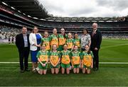 27 July 2025; Cumann na mBunscol Gary Farrell, LGFA president Trina Murray, INTO President Anne Horan, Uachtarán Chumann Lúthchleas Gael Jarlath Burns, with the Donegal team, back row, left to right, Grace McGonigle, Gaelscoil Cois Feabhaill, Moville, Donegal, Rebecca Farrell, St Patrick's NS, Castleknock, Dublin, Teegan Fahy, Clonberne NS, Clonberne, Galway, Úna Kilkenny, St Mary's PS, Mullaghbawn, Armagh, Grainne Owens, St Matthew's PS, Castlewellan, Down, front row, left to right, Orla Cunningham, St Ita's PS, Belfast, Antrim, Avril Gilmartin, St Brigid's NS, Drumcong, Leitrim, Lucy Murphy, Breaffy NS, Breaffy, Mayo, Naoise O'Brien, Rathcormac NS, Sligo, Lara Waine, St Pius X GNS, Terenure, Dublin, before the GAA INTO Cumann na mBunscol Respect Exhibition Go Games at the GAA Football All-Ireland Senior Championship final match between Kerry and Donegal at Croke Park in Dublin. Photo by Daire Brennan/Sportsfile