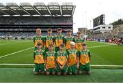 27 July 2025; The Donegal team, back row, left to right, Daithí Farrell, Scoil Bhríde, Fourmilehouse, Roscommon, Pierce Moran, Scoil Mhuire, Carrick-on-Shannon, Leitrim, Timmy Sheehan, Bishop Galvin NS, Templeogue, Dublin, Oisín Lynch, St Mary's NS, Virginia, Cavan, Seanie Gallagher, Enniskillen Integrated PS, Enniskillen, Fermanagh, front row, left to right, Calum Clarke, Scoil Mhuire agus Iosaf, Collooney, Sligo, Marc Ó Gairbhí, Gaelscoil Ultain, Baile Mhuineacháin, Co. Mhuineacháin, Michael Harte, St Malachy's PS, Ballygawley, Tyrone, Callan McGovern, St Kilian's SNS, Tallaght, Dublin, Timmy Sheehan, Bishop Galvin NS, Templeogue, Dublin, before the GAA INTO Cumann na mBunscol Respect Exhibition Go Games at the GAA Football All-Ireland Senior Championship final match between Kerry and Donegal at Croke Park in Dublin. Photo by Daire Brennan/Sportsfile