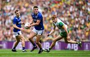 27 July 2025; Seán O'Shea of Kerry in action against Ciaran Moore of Donegal during the GAA Football All-Ireland Senior Championship final match between Kerry and Donegal at Croke Park in Dublin. Photo by Seb Daly/Sportsfile