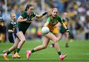 27 July 2025; Rebecca Farrell, St Patrick's NS, Castleknock, Dublin, representing Donegal, and Ella Roche, Moveen NS, Kilkee, Clare, representing Kerry, during the GAA INTO Cumann na mBunscol Respect Exhibition Go Games at the GAA Football All-Ireland Senior Championship final match between Kerry and Donegal at Croke Park in Dublin. Photo by Stephen McCarthy/Sportsfile