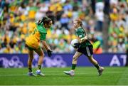 27 July 2025; Bailee Bolton, St Fiacc's NS, Graiguecullen, Laois, representing Kerry, and Grace McGonigle, Gaelscoil Cois Feabhaill, Moville, Donegal, during the GAA INTO Cumann na mBunscol Respect Exhibition Go Games at the GAA Football All-Ireland Senior Championship final match between Kerry and Donegal at Croke Park in Dublin. Photo by Stephen McCarthy/Sportsfile