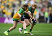 27 July 2025; Ellie Dooley, Herbertstown NS, Herbertstown, Limerick, representing Kerry, and Avril Gilmartin, St Brigid's NS, Drumcong, Leitrim, representing Donegal, during the GAA INTO Cumann na mBunscol Respect Exhibition Go Games at the GAA Football All-Ireland Senior Championship final match between Kerry and Donegal at Croke Park in Dublin. Photo by Stephen McCarthy/Sportsfile