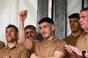 28 July 2025; Kerry player Paudie Clifford, centre, gestures to the crowd during homecoming celebrations in Tralee for Kerry, the All-Ireland Senior Football Champions, after their victory over Donegal in the GAA Football All-Ireland Senior Championship final at Croke Park on Sunday. Photo by Piaras Ó Mídheach/Sportsfile