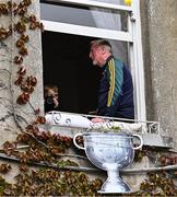 28 July 2025; Tralee residents hang a replica of the Sam Maguire Cup from their window during homecoming celebrations for Kerry, the All-Ireland Senior Football Champions, after their victory over Donegal in the GAA Football All-Ireland Senior Championship final at Croke Park on Sunday. Photo by Piaras Ó Mídheach/Sportsfile