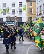 28 July 2025; A marching band leads the open top bus carrying the winning Kerry side through the streets of Tralee during homecoming celebrations following Kerry's victory over Donegal in the GAA Football All-Ireland Senior Championship final at Croke Park on Sunday. Photo by Piaras Ó Mídheach/Sportsfile