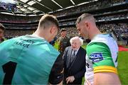 27 July 2025; President of Ireland Michael D Higgins is introduced to Donegal goalkeeper Shaun Patton by captain Patrick McBrearty, right, before the GAA Football All-Ireland Senior Championship final match between Kerry and Donegal at Croke Park in Dublin. Photo by Stephen McCarthy/Sportsfile
