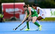 29 July 2025; Kathryn Mullan of Ireland in action against Luciana Molina of Spain during the women's hockey international match between Ireland and Spain at the Sport Ireland Campus in Dublin. Photo by Ben McShane/Sportsfile