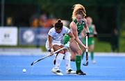 29 July 2025; Lucia Jimenez of Spain in action against Michelle Carey of Ireland during the women's hockey international match between Ireland and Spain at the Sport Ireland Campus in Dublin. Photo by Ben McShane/Sportsfile
