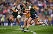 27 July 2025; Emily Kavanagh, St Colman's NS, Mucklagh, Offaly, representing Kerry, and Grace McGonigle, Gaelscoil Cois Feabhaill, Moville, Donegal, during the GAA INTO Cumann na mBunscol Respect Exhibition Go Games at the GAA Football All-Ireland Senior Championship final match between Kerry and Donegal at Croke Park in Dublin. Photo by Ramsey Cardy/Sportsfile