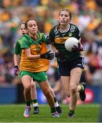 27 July 2025; Eimear Farrell, St Oliver Plunkett PS, Blackcastle, Meath, representing Kerry, and Grace McGonigle, Gaelscoil Cois Feabhaill, Moville, Donegal, during the GAA INTO Cumann na mBunscol Respect Exhibition Go Games at the GAA Football All-Ireland Senior Championship final match between Kerry and Donegal at Croke Park in Dublin. Photo by Ramsey Cardy/Sportsfile