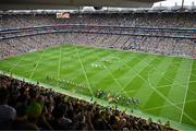 27 July 2025; The Kerry and Donegal teams march in the pre-match parade behind The Artane Band before the GAA Football All-Ireland Senior Championship final match between Kerry and Donegal at Croke Park in Dublin. Photo by Piaras Ó Mídheach/Sportsfile