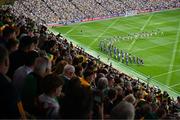 27 July 2025; The Kerry and Donegal teams march in the pre-match parade behind The Artane Band before the GAA Football All-Ireland Senior Championship final match between Kerry and Donegal at Croke Park in Dublin. Photo by Piaras Ó Mídheach/Sportsfile