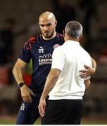 30 July 2025; Shelbourne head coach Joey O'Brien, left, and Qarabag manager Gurban Gurbanov after the UEFA Champions League Second Qualifying Round second leg match between Qarabag FK and Shelbourne at Tofiq Bahramov Republican Stadium in Baku, Azerbaijan. Photo by Aziz Karimov/Sportsfile