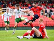 19 July 2025; Charlie Lutz of Cork City in action against Owen Norton of Leicester Celtic during the Sports Direct Men’s FAI Cup second round match between Cork City and Leicester Celtic at Turner’s Cross in Cork. Photo by Stephen McCarthy/Sportsfile