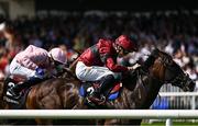 31 July 2025; Which Wolf Wins, right, with Dylan Browne McMonagle up, on their way to winning the Guinness Irish EBF Nursery Handicap during day four of the Galway Races Summer Festival at Ballybrit Racecourse in Galway. Photo by Seb Daly/Sportsfile