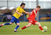 19 July 2025; Cillian Ryan of Shelbourne in action against Shane Carmody of Fairview Rangers during the Sports Direct Men’s FAI Cup second round match between Fairview Rangers and Shelbourne at Singland Park in Limerick. Photo by Stephen McCarthy/Sportsfile