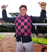31 July 2025; Jockey Jack Kennedy celebrates after winning the Guinness Galway Hurdle Handicap on Ndaawi, following a steward's enquiry, during day four of the Galway Races Summer Festival at Ballybrit Racecourse in Galway. Photo by Seb Daly/Sportsfile